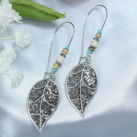 Ethnic Style Geometric Metal Turquoise Inlaid Tassel Earrings